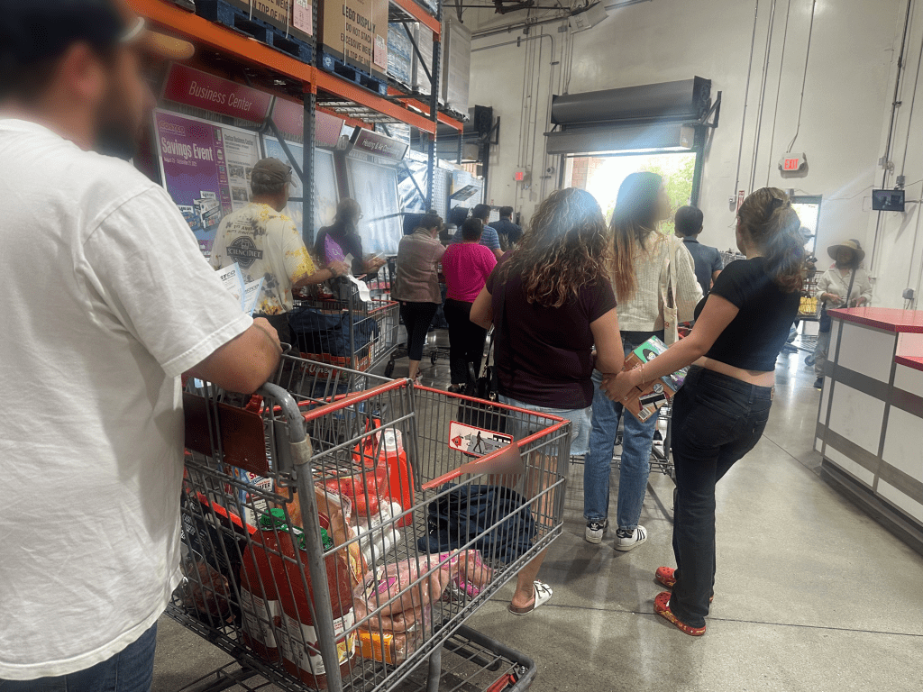 waiting at the exit of Costco for the receipt check.